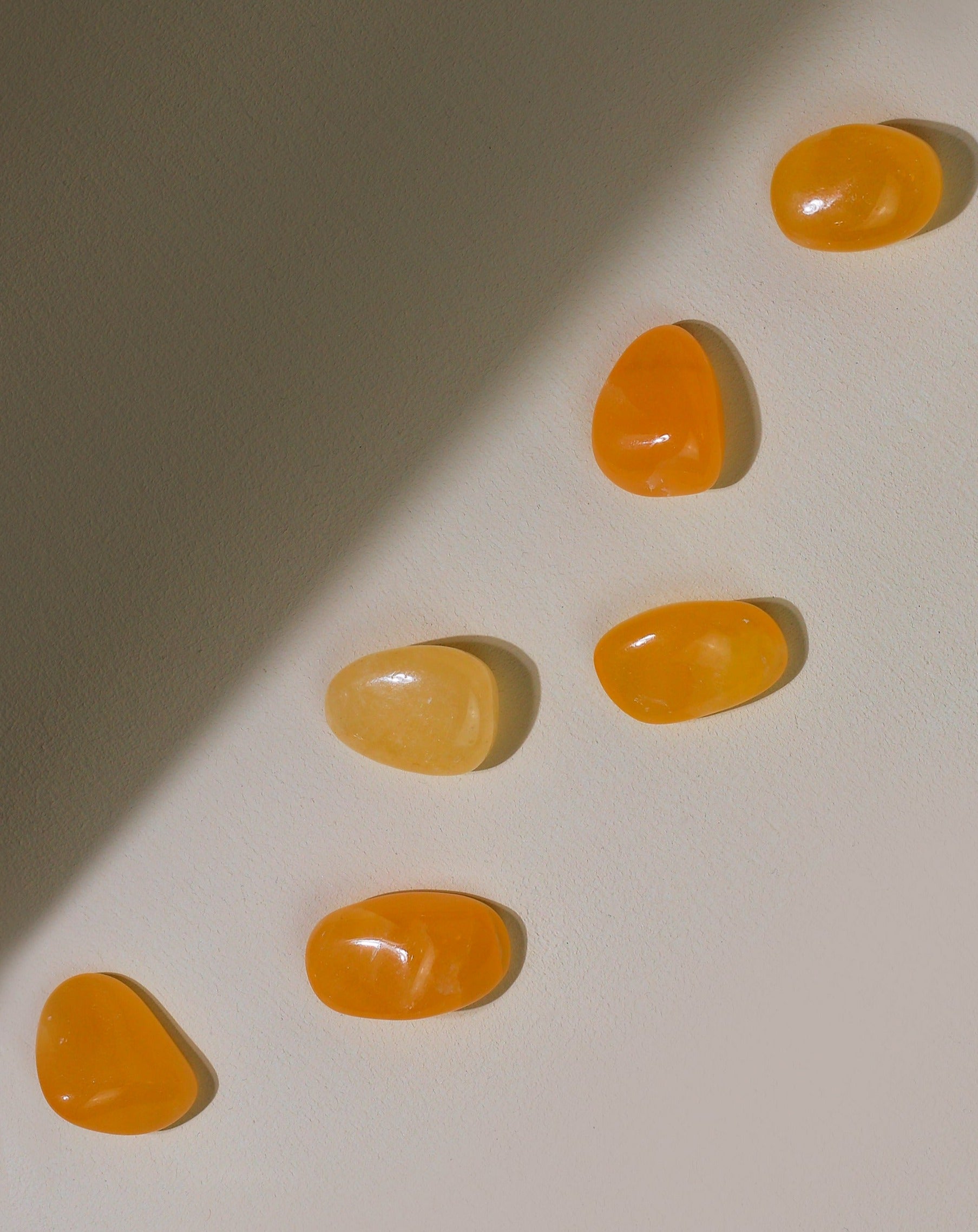 Orangencalcit Taschenstein