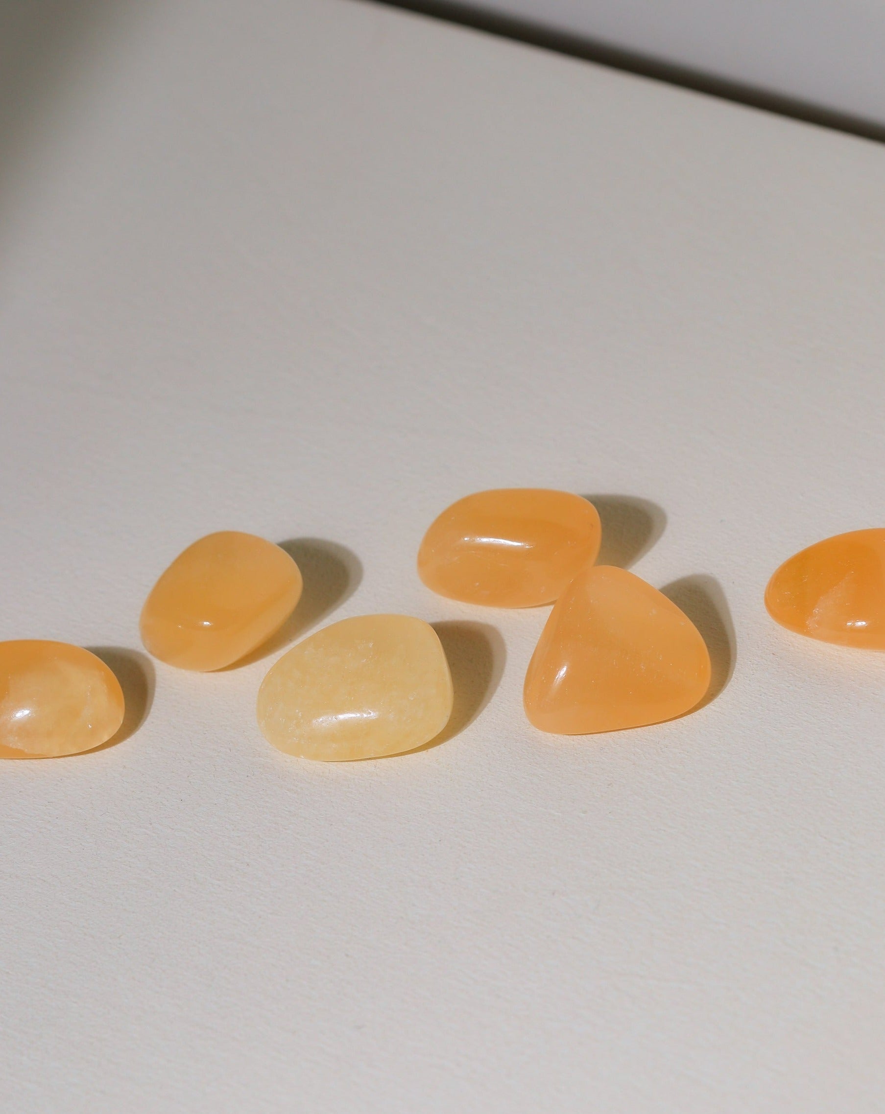 Orangencalcit Taschenstein