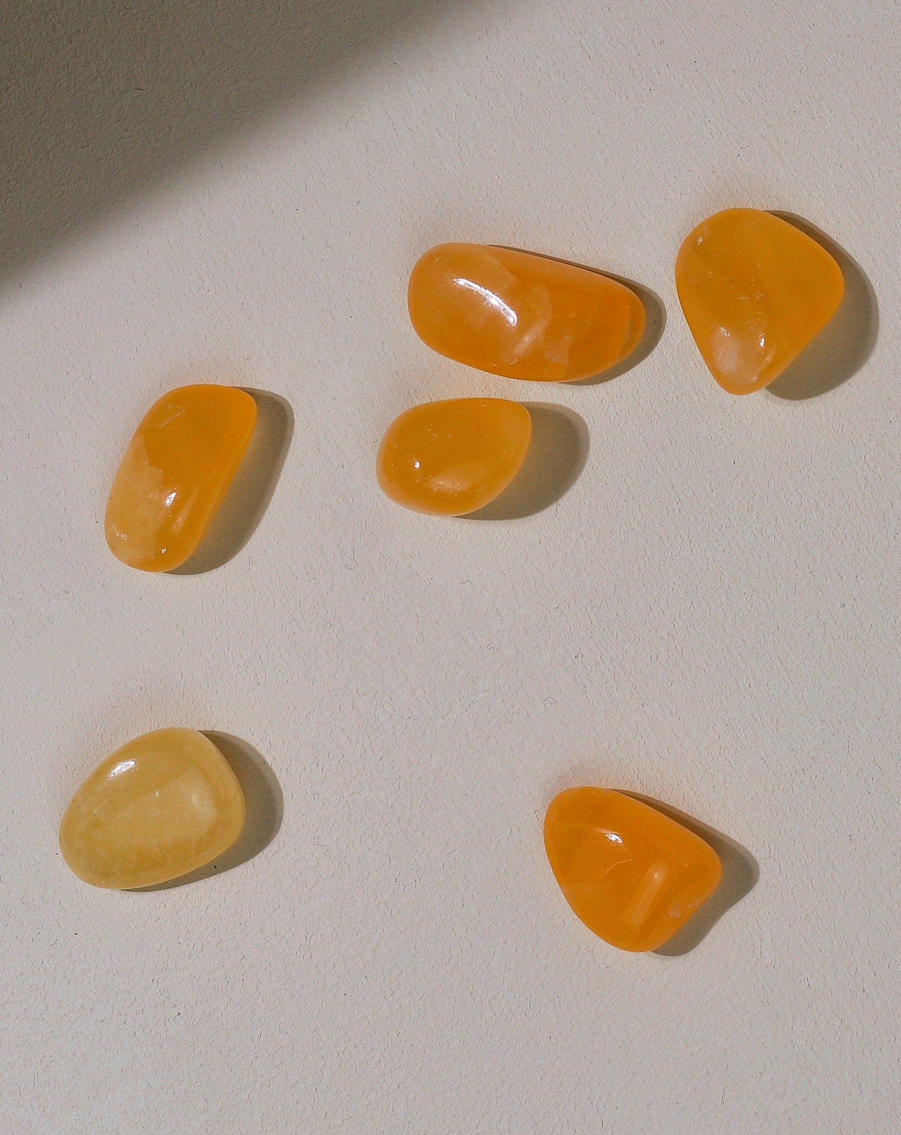 Orangencalcit Taschenstein