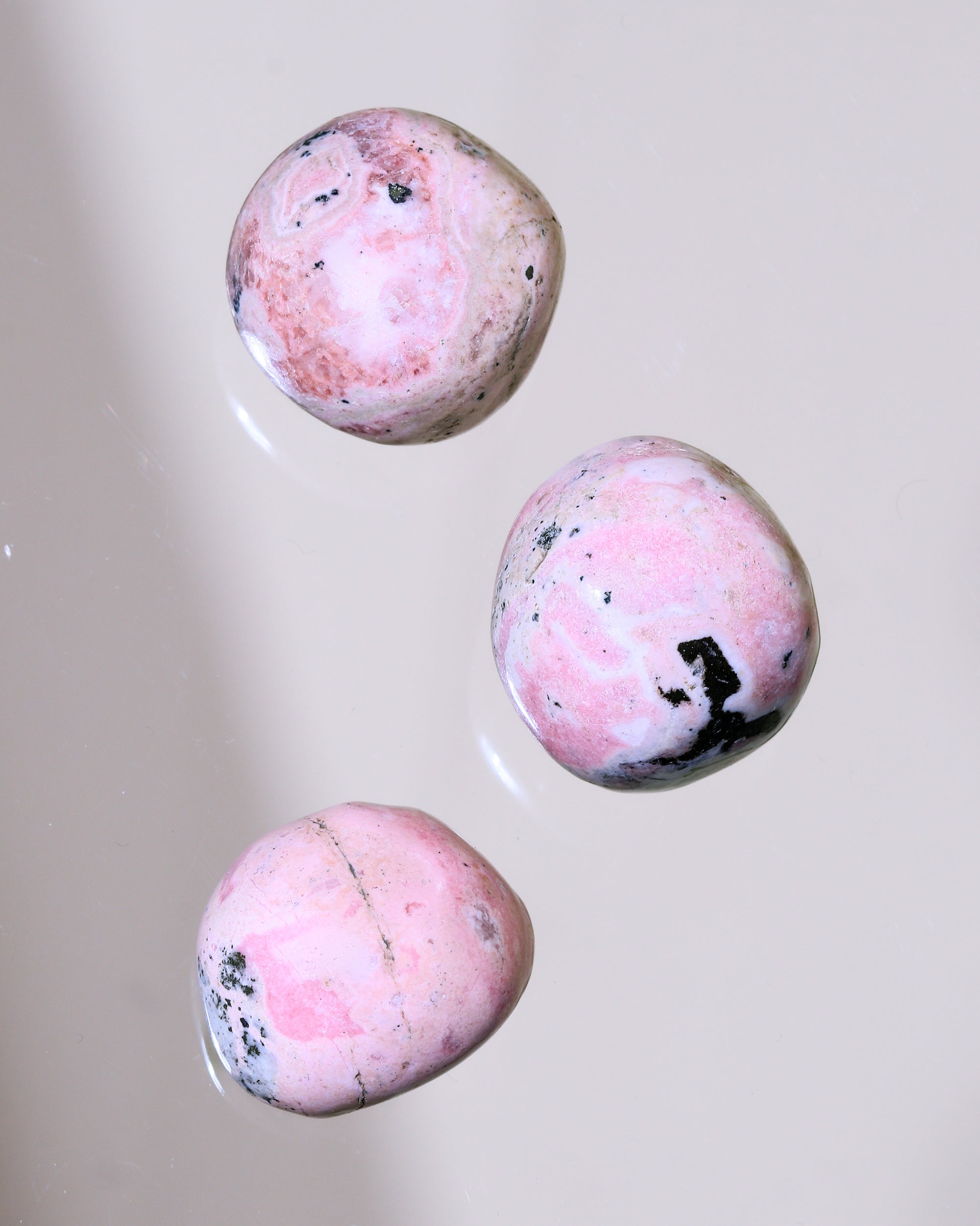 Rhodonite pocket stone