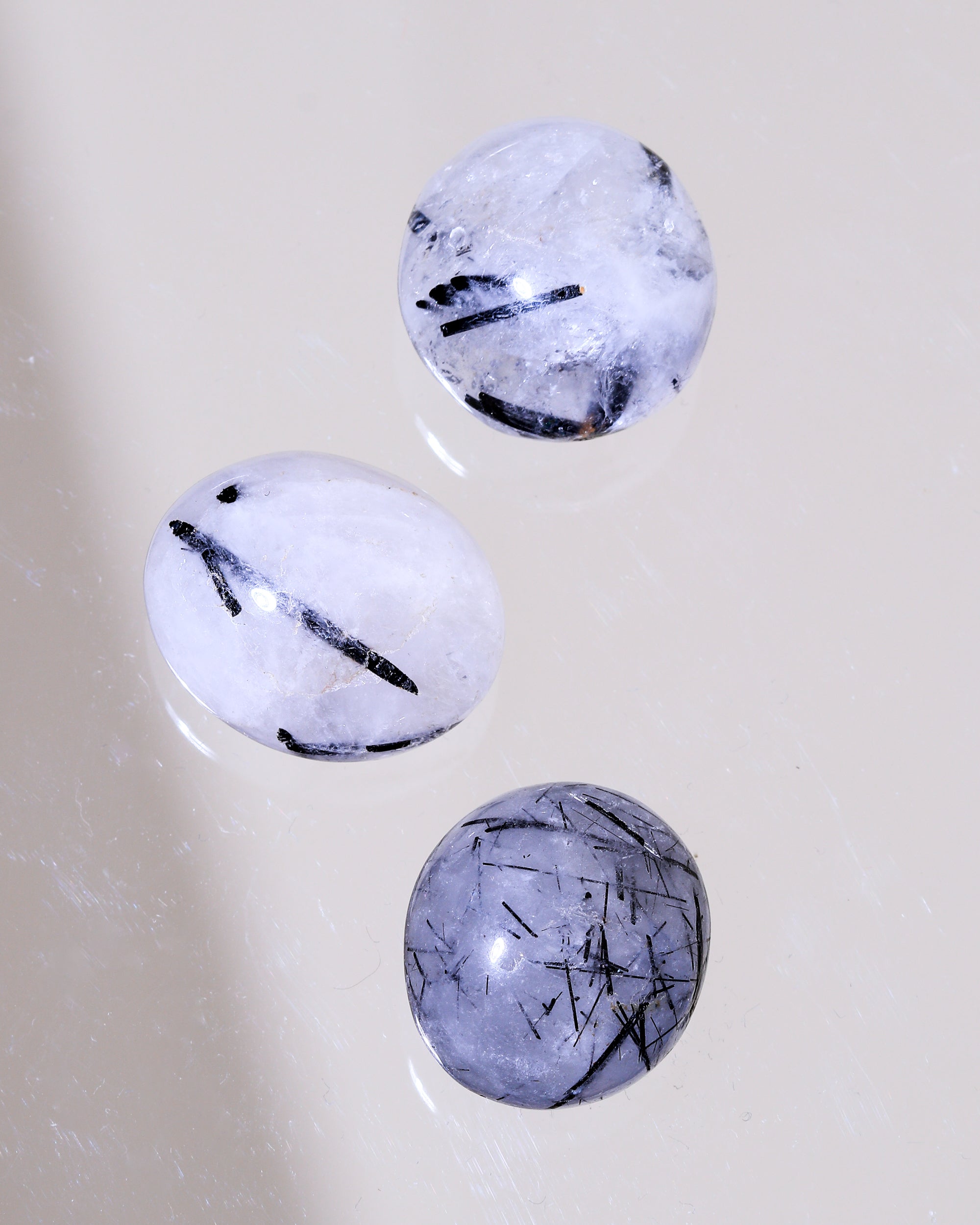 Tourmaline quartz pocket stone